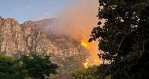 Firefighters Face Off Against Table Mountain Wildfires with Aerial Assistance